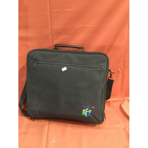 187 - Nintendo 64 bag with Gamester LMP controller and a selection of Nintendo 64 games to include War zon... 