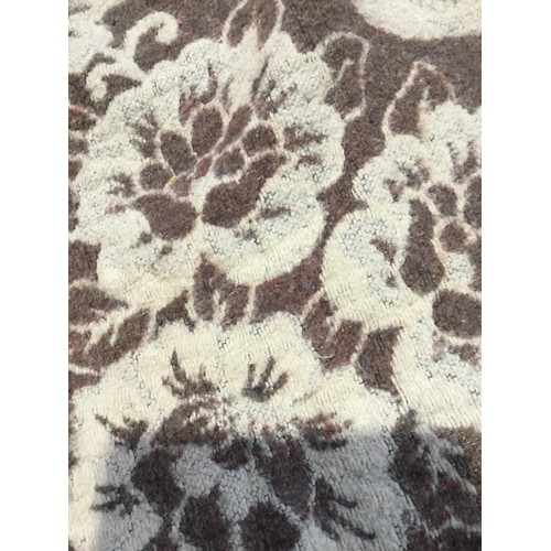 429 - Brown and cream floral woven throw with brown Tassel edging approx size 230 x 180 cm