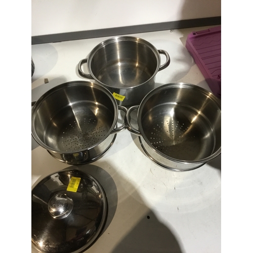 121 - Stack of Saucepans steamer set