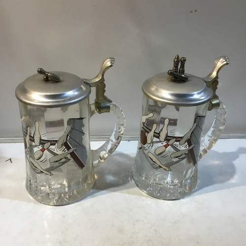 65 - Pair of ten pin bowling steins