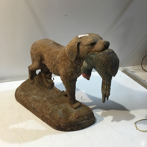 79 - Cast iron Door stop of dog holding a Pheasant