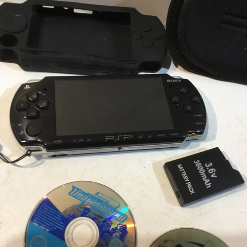 93 - Sony PSP handheld console plus games