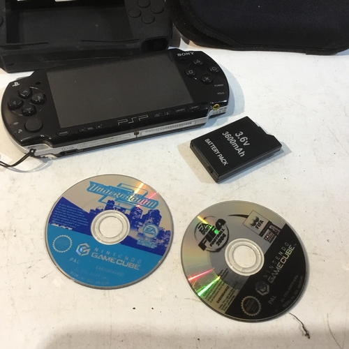 93 - Sony PSP handheld console plus games