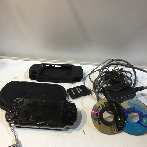 93 - Sony PSP handheld console plus games