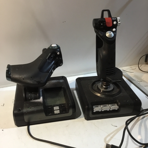 110 - Saitek x52 pro joystick plus one other