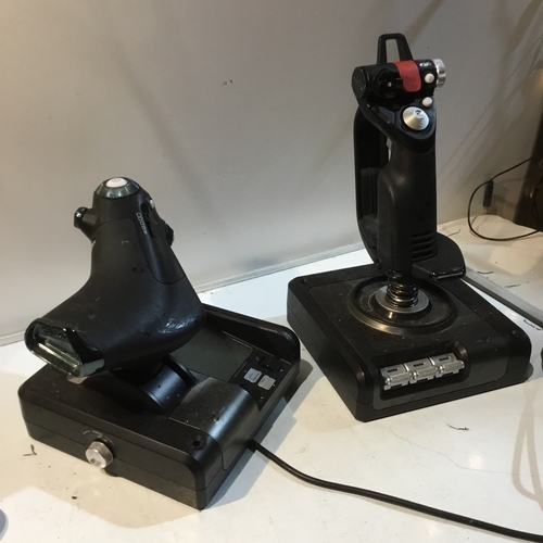 110 - Saitek x52 pro joystick plus one other