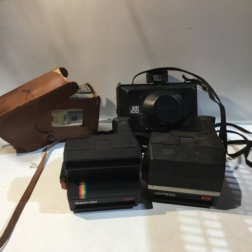 115 - Collection of cameras includes polaroid