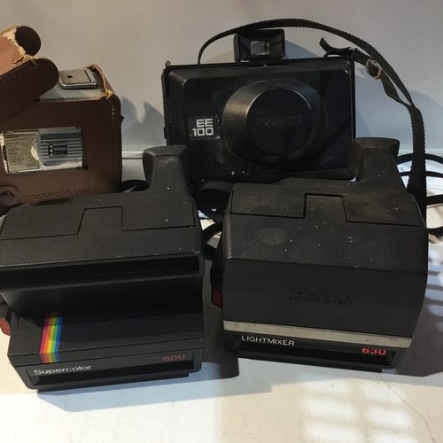 115 - Collection of cameras includes polaroid