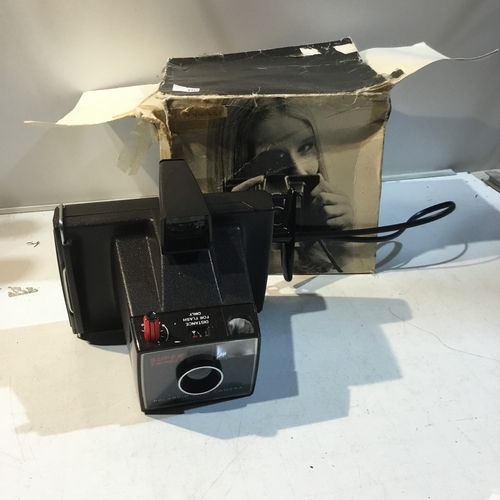 117 - Super swinger polaroid land camera in box