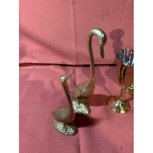 21 - Brass Pair of candle sticks 24cm, Pair of Goblets 16 cm and 2 Swans 1 x 23 cm & 1 x 16 cm