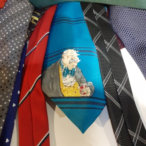 2 - Large quantity of mens ties in good clean condition on tie hanger.