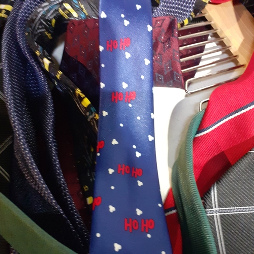 2 - Large quantity of mens ties in good clean condition on tie hanger.