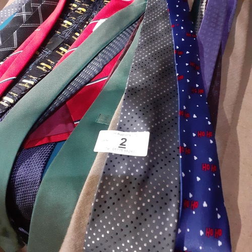 2 - Large quantity of mens ties in good clean condition on tie hanger.