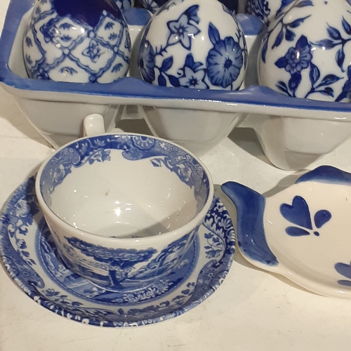 11 - Blue/White lot. Includes Sadler teapot, Spode cup & saucer etc and 6 decorative eggs in holder. Attr... 