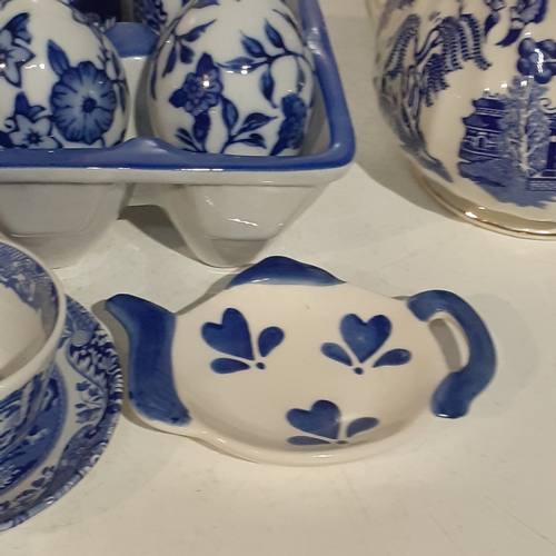 11 - Blue/White lot. Includes Sadler teapot, Spode cup & saucer etc and 6 decorative eggs in holder. Attr... 