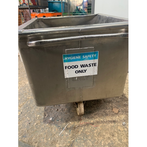 132 - Large stainless steel metal food waste bin on wheels. Approx 26” x 26”