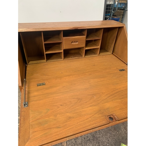 149 - Beautiful writing desk with carved oriental design to drop down door with wooden stool