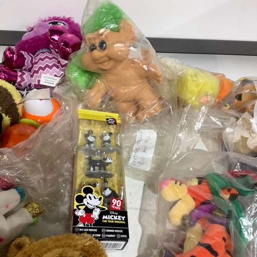 310 - Collection of soft toys includes Winnie Pooh and friends plus Trolls and more