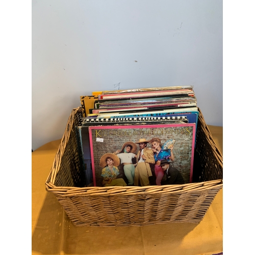 710 - Wicker basket with selection of vinyl records