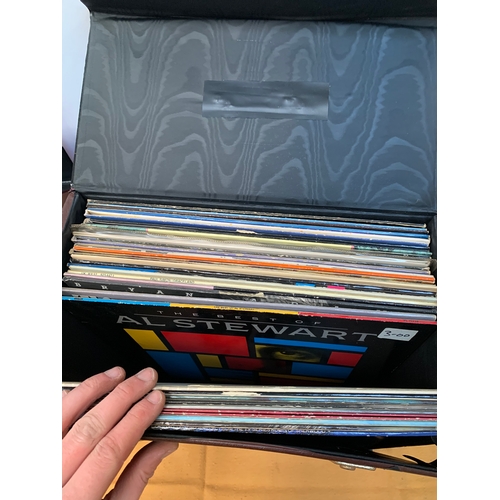 727 - Selection of vinyl records in two leather cases