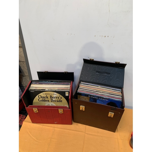 727 - Selection of vinyl records in two leather cases