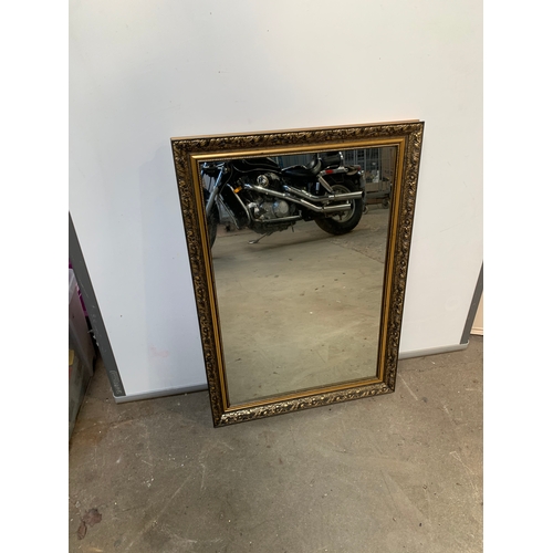 730 - Large mirror in intricate gold frame