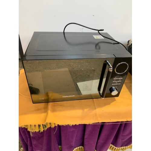 736 - Morphy Richards Microwave in new condition