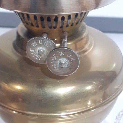 158 - Brass, double wick oil lamp. With glass chimney. UK made.