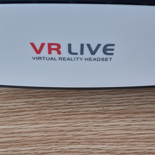 2 - VR Live, virtual reality headset. Model number 77137. Looks new and unused.