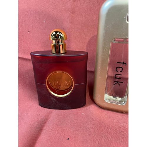 40 - Part used but mainly full perfume inc YSL Opium, FCUK her and replica black opium