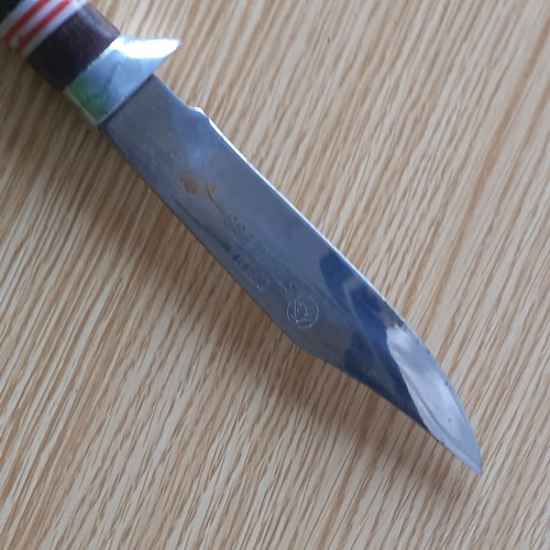 4 - Stainless steel blade in sheath. Solid piece. Minor wear.