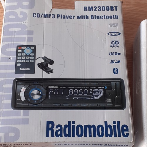 8 - Radiomobile car radio. CD/MP3 player ith bluetooth. Model RM300BT. As new in box. Box has wear