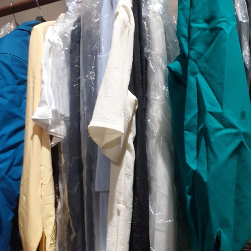 20 - Large rail full of ladies clothing. Mixed tops, dresses, suits etc. Modern and vintage. Overall good... 