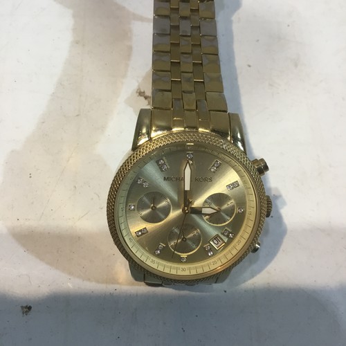 73 - Michael Kors stainless steel gold coloured watch