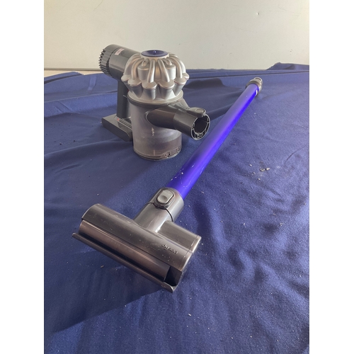 130 - Dyson rechargeable hand held vacuum cleaner untested not power leads