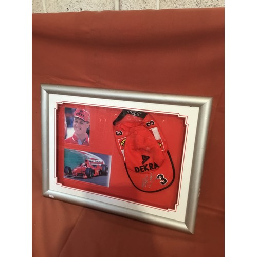 151 - Sports memorabilia - framed and glazed picture of Micheal Schumacher formula 1 racing driver with si... 