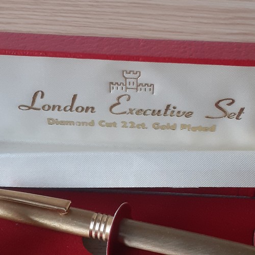 42A - 22ct Gold plated pen and cufflink set branded London Executive