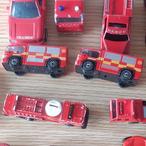 48A - Quantity of red cars including fire engines and more. Varying conditions from very good to playworn