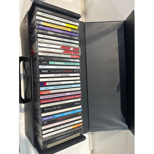 22 - Selection of CDs in pair of hard cases