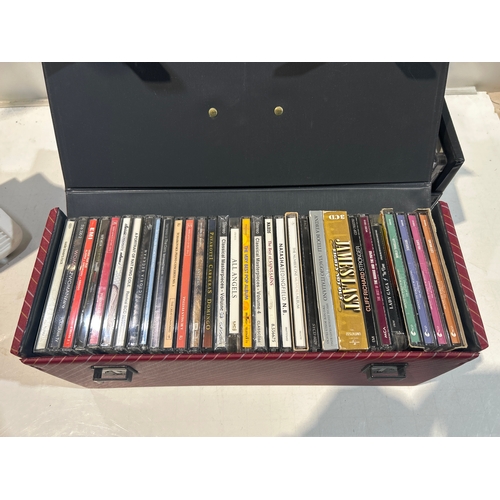 22 - Selection of CDs in pair of hard cases