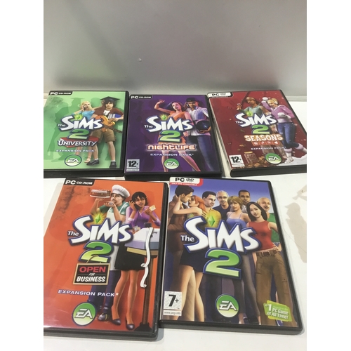 196 - 5 sims 2 pc cd- roms