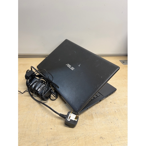 283A - Asus X551C laptop - powers on - needs resetting - has line on the screen - comes with charger