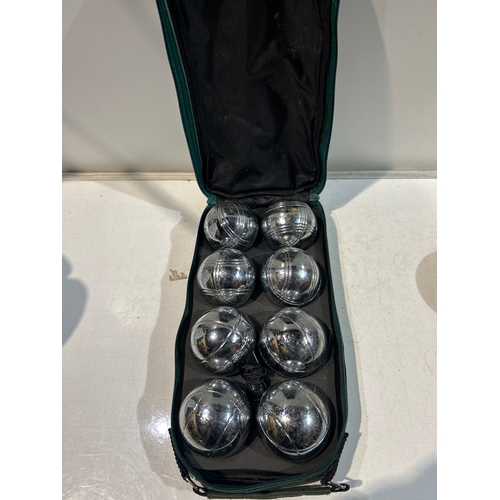 243 - Traditional garden boules set in case