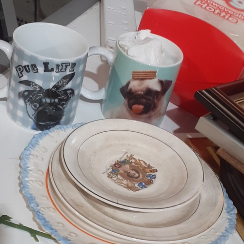 292A - Mixed lot of collectible and household bits. Includes Royal Memorabilia, New Pug mugs, new items, bl... 