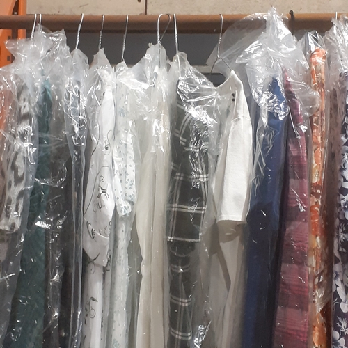 138A - Large rail full of ladies clothing, evening wear, suits, dresses and more. Good,  clean condition