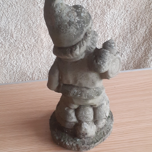 140A - Solid stone/concrete garden gnome sitting on a snail, holding a lantern. Great detail. No damage but... 