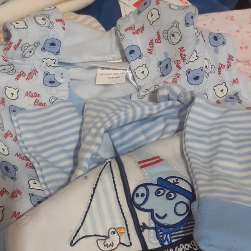 142A - Quantity of baby clothing. Sleepwear, coat, tops and vests etc. Mostly boy and newborn or next size.... 