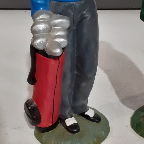 148A - Golfer figures in a pottery type material. Great detail and tall at approx 12