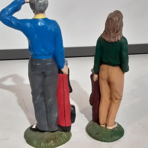 148A - Golfer figures in a pottery type material. Great detail and tall at approx 12