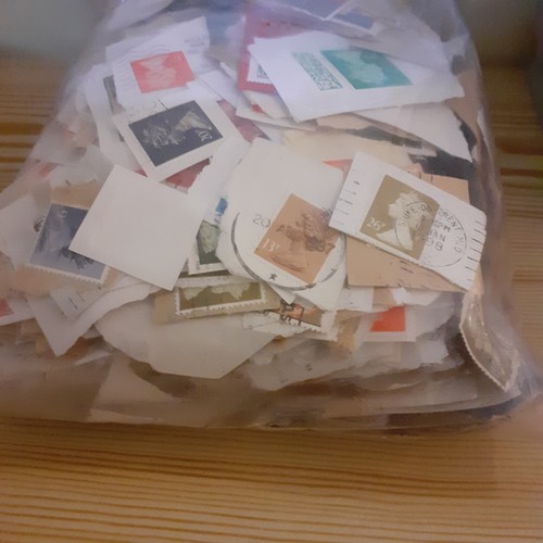 146A - Large quantity of used postage stamps. Hundreds